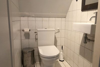 Schönes Ferienhaus mit Kamin in einem Ferienp...