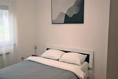Ampio appartamento con terrazza coperta