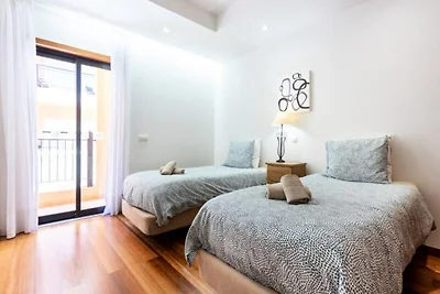 Wohnung in Luz mit Meerblick & Pools