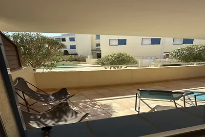 Appartement met terras en toegang tot het...