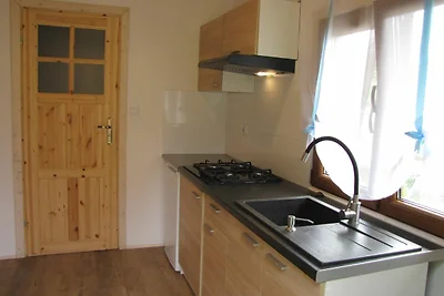 Ferienhaus aus Holz in der Nähe des Sees