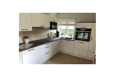 De begane grond van het Neiwoi-huis onder een...