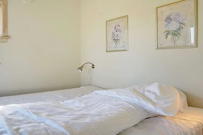 6 person holiday park home in Gudhjem
