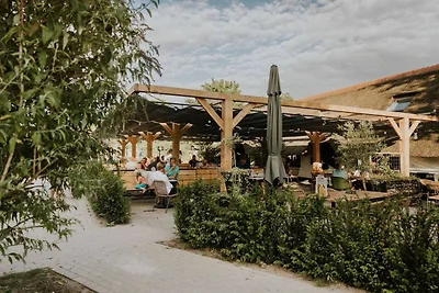 Luxe familielodge met slaaphoekje buiten