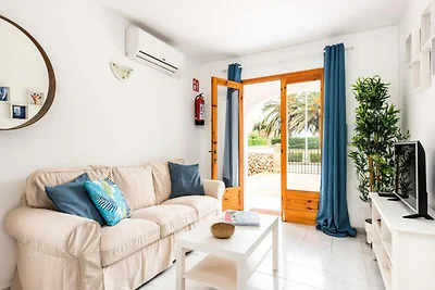 Wohnung in Cala Blanca mit Poolblick