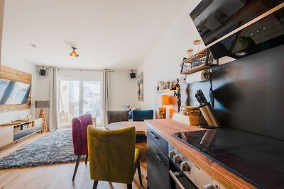 Appartement met skibus voor de deur