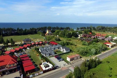 Einstöckige Ferienhäuser in Strandnähe, Gąski