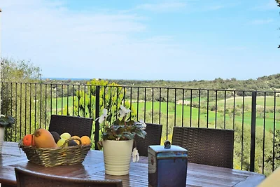 Huis in Muro met uitzicht op de baai van...