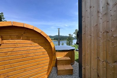 Tinyhouse  con sauna e vasca idromassaggio.