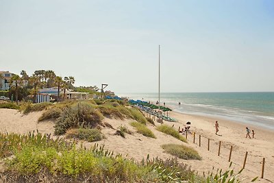 Appartement aan het strand met gedeeld...