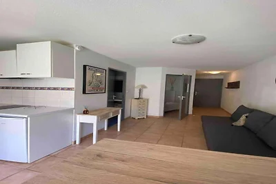 Appartement aan het strand met zwembad