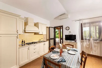 Appartamento con piscina comune
