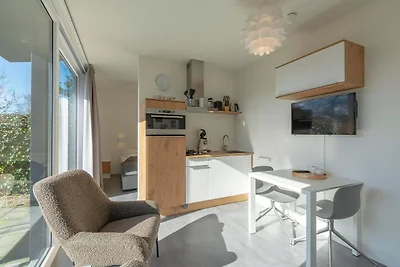 Suite aan het strand met tuin