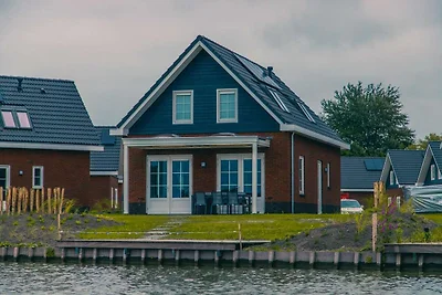 Duurzame watervilla met sauna, bij het...