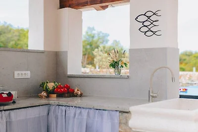 Ferienhaus in Risika mit Schwimmbecken