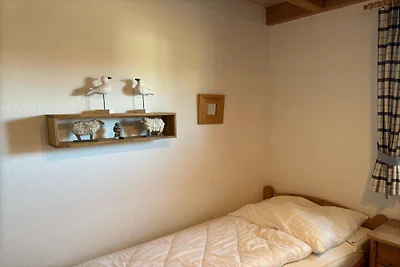 Ferienhaus mit Kaminofen in Burhave
