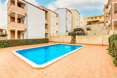 Zolder met terrazza en zwembad condivisa