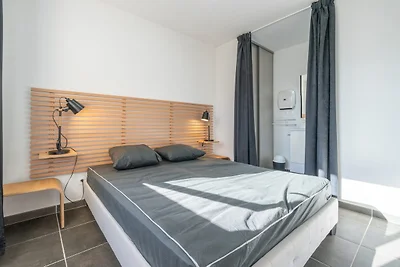 Wohnung in Sérignan mit Garten