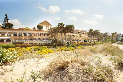 Appartement aan het strand met gedeeld...