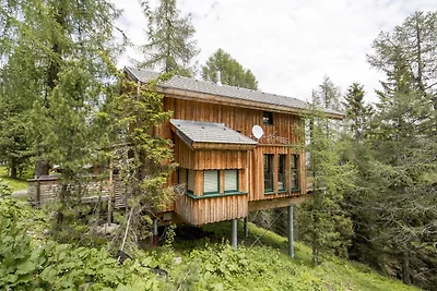 Chalet attraente con vasca idromassaggio