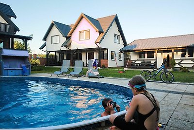 Luxuriöse Ferienhäuser mit Swimmingpool, Whir...