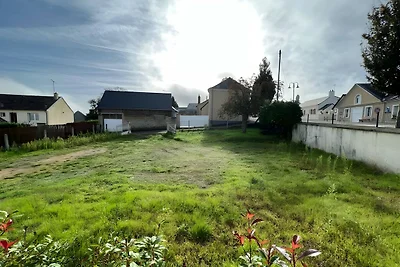 Warmer und einladender Rückzugsort mit Garten