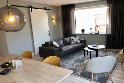 Lodge mit Blick auf die Kirche und die Dünen