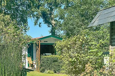 Incantevole cottage dal tetto di paglia a...