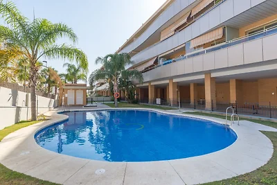 Appartamento con terrazza, piscina,...