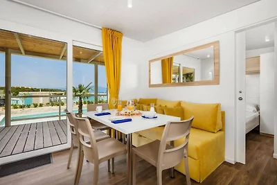 Mobilheim im Camping Omisal mit Pool