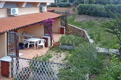 Ferienhaus in Porto Pollo mit Garten