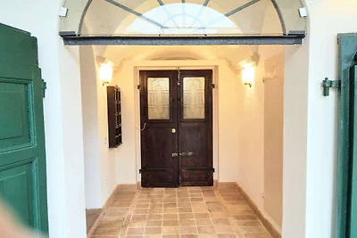 Apartment in a village with swimming pool