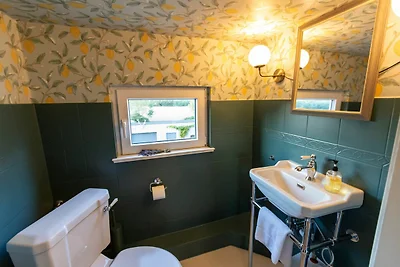 Reetdachkate Fjord Cottage - Haushälfte...