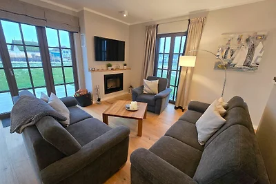 Reetland am Meer Luxus Reetdachvilla mit 3 Sc...