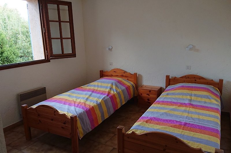 Chambre 3 avec 2 lits simples