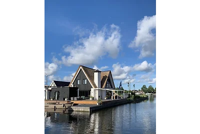 Luxe 5* waterfront family villa