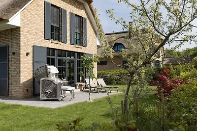 Reetdachhaus Meeresleuchten