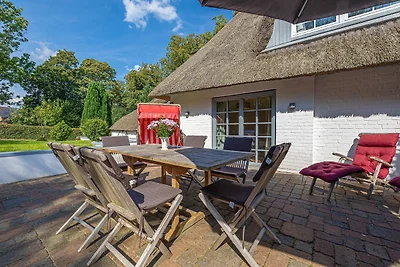 Weisse Reetdachkate Wohnung 1