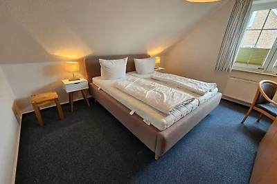 Ostseekoje im Haus zwischen den