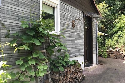 Naturhäuschen mit Gartenwhirlpool
