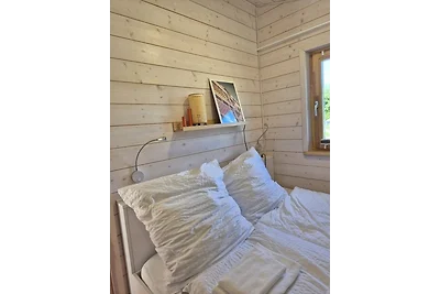 Modernes Tiny House mit Naturblick