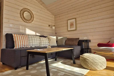 Modernes Tiny House mit Naturblick
