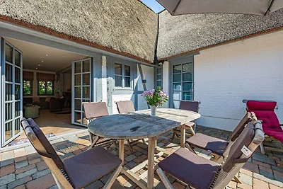 Weisse Reetdachkate Wohnung 2