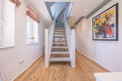 Weisse Reetdachkate Wohnung 1