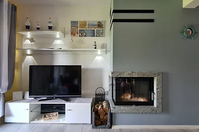 Ferienhaus Lilja mit Garten, Kamin