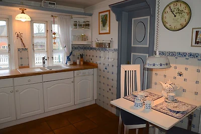 Ferien unterm Reetdach Whg 01