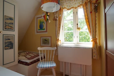 Ferien unterm Reetdach Whg 01