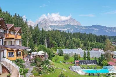 Chalet / Apartment mit Gartenblick