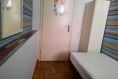 Single room with shared bathroom