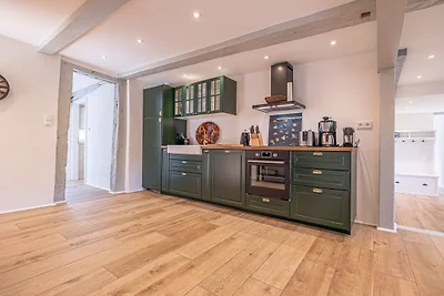 Weisse Reetdachkate Wohnung 1